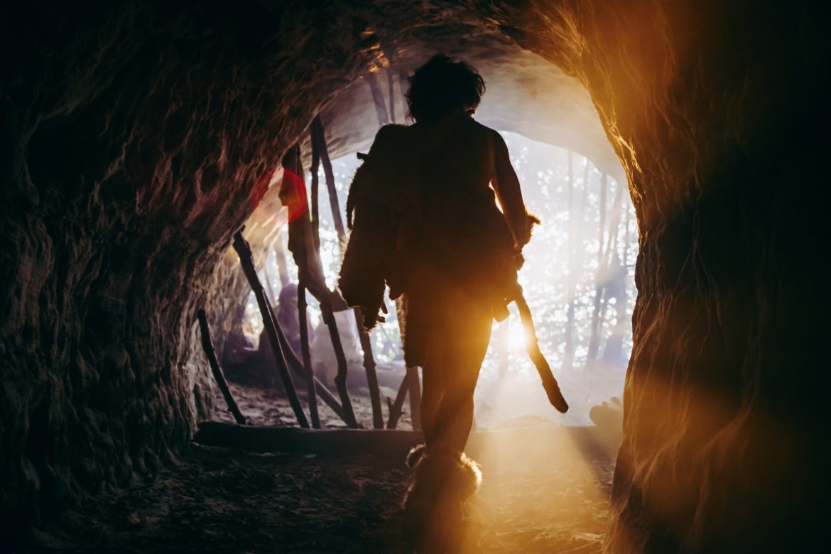 Primeval Caveman in His Cave